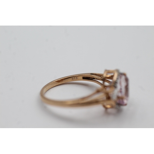 64 - 9ct Gold Pink Gemstone & Diamond Twist Setting Dress Ring (3g) size N1/2