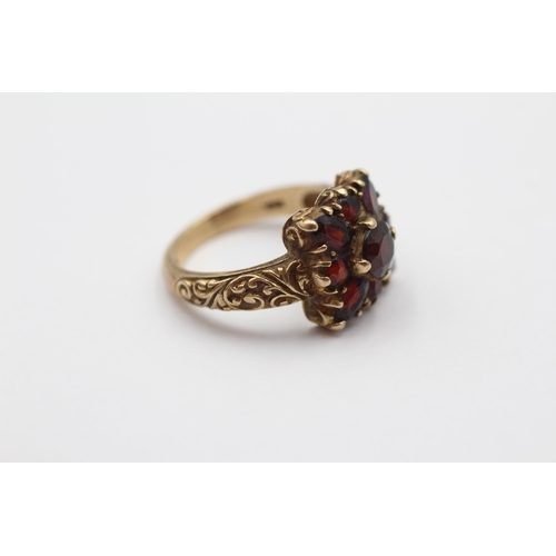 69 - 9ct Gold Vintage Garnet Cluster Ornate Dress Ring (4.3g) size M1/2