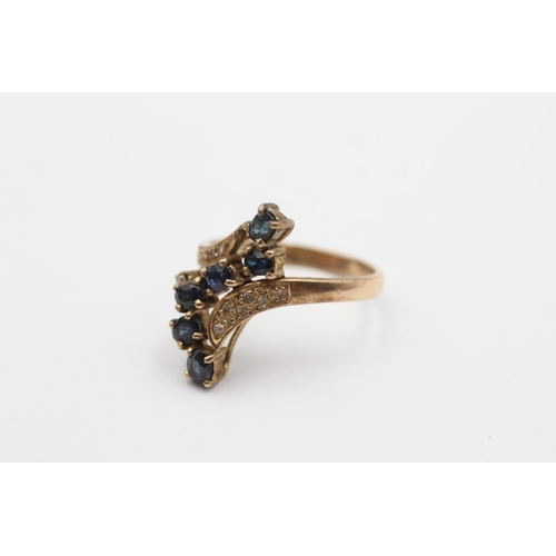 101 - 9ct Gold Diamond And Sapphire Journey Bypass Statement Ring (3.3g) size M1/2