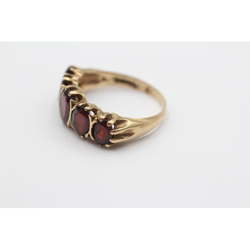 106 - 9ct Gold Garnet Oval Cut Graduated Five Stone Gypsy Ring (4.3g) size S