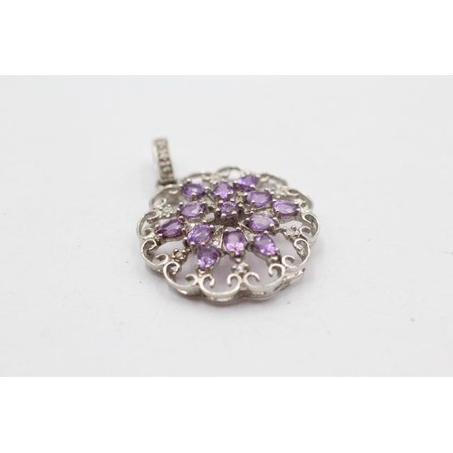 129 - 9ct White Gold Diamond And Amethyst Ornate Openwork Lace Cluster Pendant (3.3g)