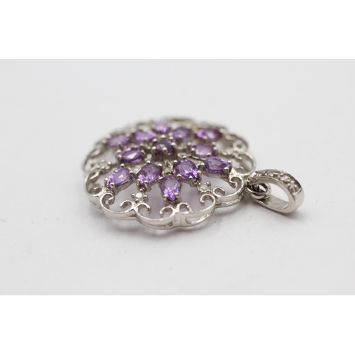 129 - 9ct White Gold Diamond And Amethyst Ornate Openwork Lace Cluster Pendant (3.3g)