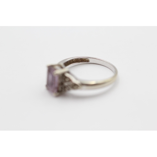 133 - 9ct White Gold Diamond And Amethyst Solitaire And Shoulder Set Ring (3g) size N1/2