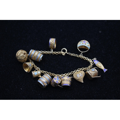 154 - A Traditional Silver And Enamel Filigree Charm Bracelet (22g)