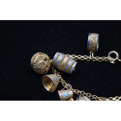 154 - A Traditional Silver And Enamel Filigree Charm Bracelet (22g)