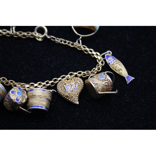 154 - A Traditional Silver And Enamel Filigree Charm Bracelet (22g)