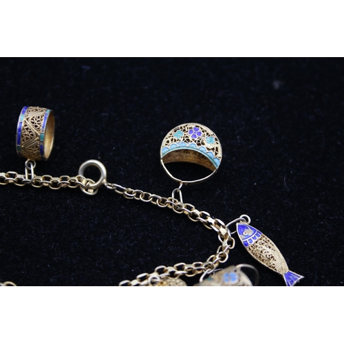 154 - A Traditional Silver And Enamel Filigree Charm Bracelet (22g)