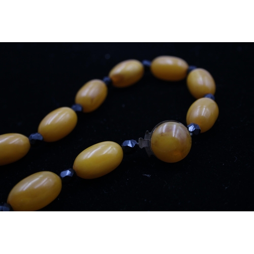 164 - A Single Strand Bakelite Bead Necklace (82g)