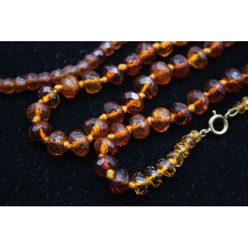 165 - Two Antique Amber Bead Necklaces (39g)