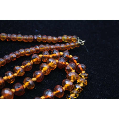 165 - Two Antique Amber Bead Necklaces (39g)