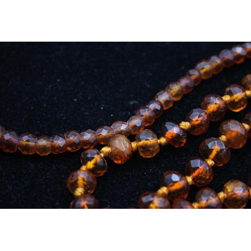 165 - Two Antique Amber Bead Necklaces (39g)