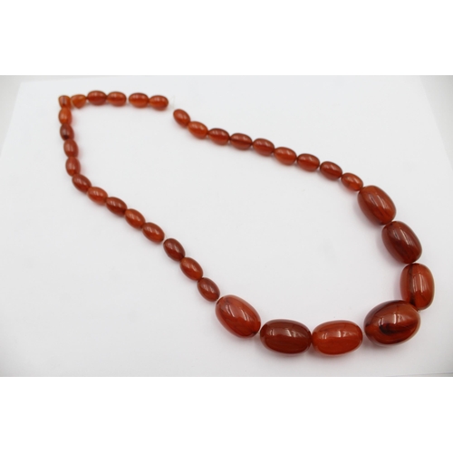 193 - A Single Strand Bakelite Bead Necklace, In Need Of A New Clasp (72g)