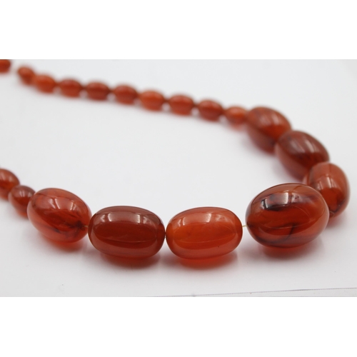 193 - A Single Strand Bakelite Bead Necklace, In Need Of A New Clasp (72g)