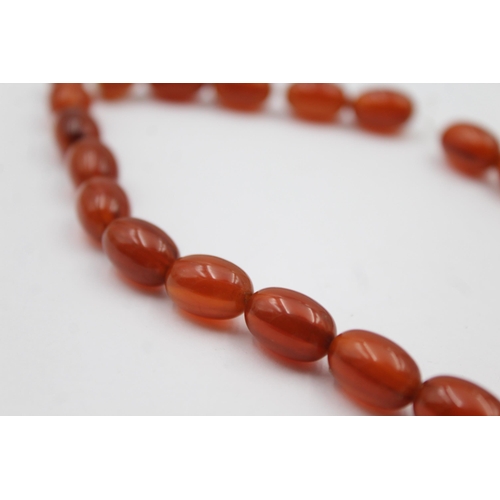 193 - A Single Strand Bakelite Bead Necklace, In Need Of A New Clasp (72g)