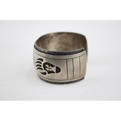 197 - A Silver Native American Cutwork Bangle (72g)