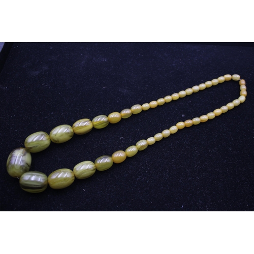 199 - A Single Strand Applejuice Bakelite Bead Necklace (63g)