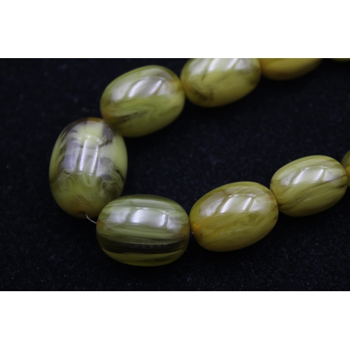 199 - A Single Strand Applejuice Bakelite Bead Necklace (63g)