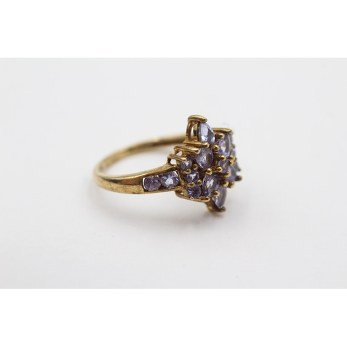 72 - 9ct Gold Tanzanite Floral Cluster Dress Ring (2.6g) size M1/2