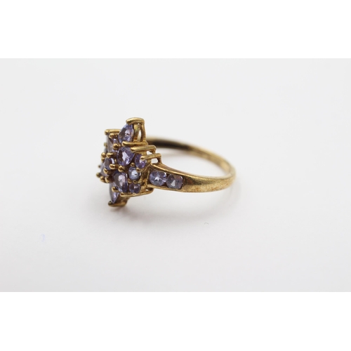 72 - 9ct Gold Tanzanite Floral Cluster Dress Ring (2.6g) size M1/2