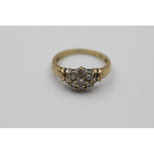 87 - 9ct Gold Diamond Flower Cluster Shoulder Detail Dress Ring (2.2g) size J1/2