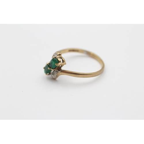 96 - 9ct White And Yellow Gold Diamond And Emerald Highlighted Toi & Moi Bypass Ring (1.5g) size M