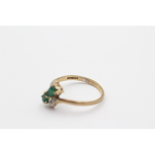 96 - 9ct White And Yellow Gold Diamond And Emerald Highlighted Toi & Moi Bypass Ring (1.5g) size M