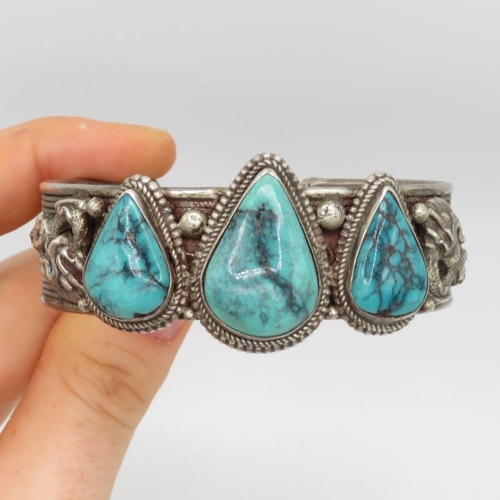 159 - A Silver Chinese Export Turquoise Set Bangle With A Dragon Design (70g)