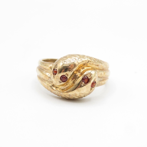 1 - 9ct gold snake ring with ruby eyes 7.5g  size T