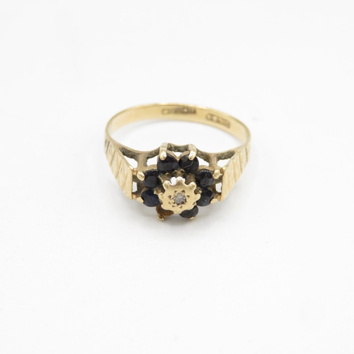 132 - 9ct gold, diamond and sapphire ring size P  2.2g