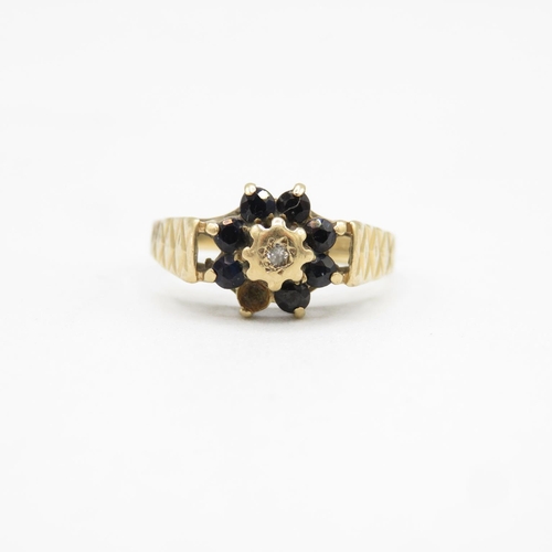 132 - 9ct gold, diamond and sapphire ring size P  2.2g