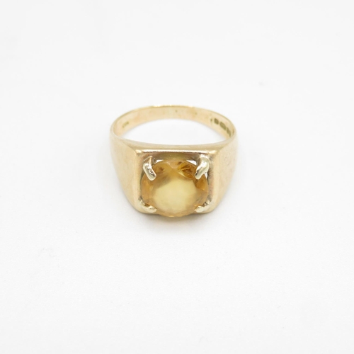 133 - 9ct gold and yellow paste stone ring size M