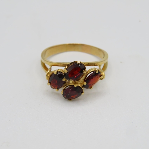 147 - 18ct gold and garnet ring size P  3.8g