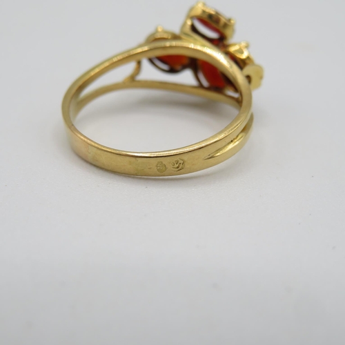 147 - 18ct gold and garnet ring size P  3.8g