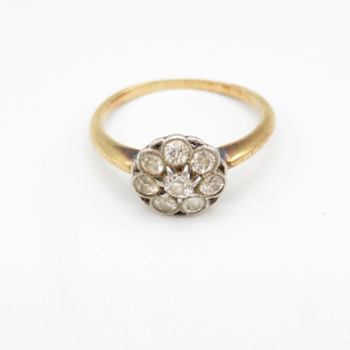 154 - 18ct gold and diamond flower shaped ring size M  2.6g