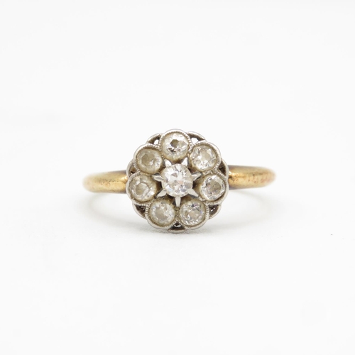 154 - 18ct gold and diamond flower shaped ring size M  2.6g