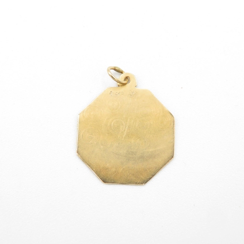 199 - 14ct gold STOP pendant  21mm wide 1.6g