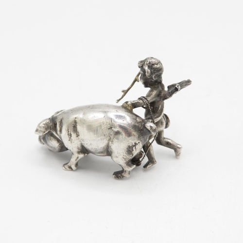 254 - Cast silver Cherub with pig 27g  50mm long