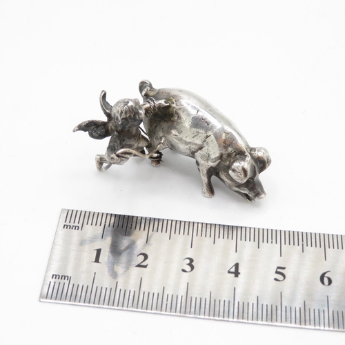 254 - Cast silver Cherub with pig 27g  50mm long