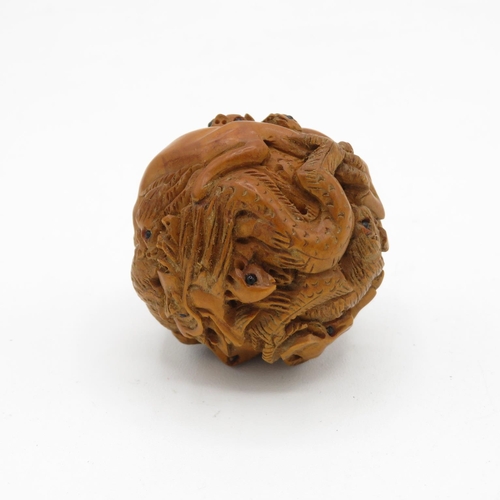 259 - Zoomorphic carved wooden Netsuke with glass eyes 45mm diameter