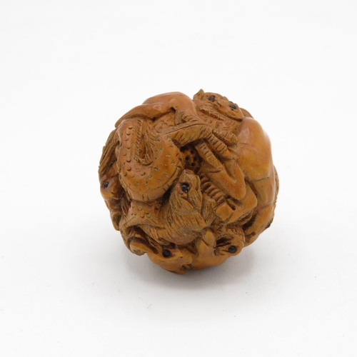 259 - Zoomorphic carved wooden Netsuke with glass eyes 45mm diameter