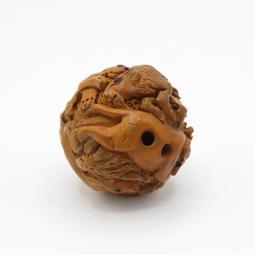 259 - Zoomorphic carved wooden Netsuke with glass eyes 45mm diameter