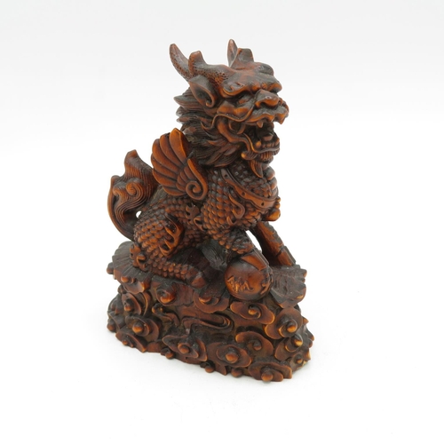 268 - Carved fruitwood Fu dog with incredible detail 100mm high