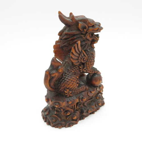 268 - Carved fruitwood Fu dog with incredible detail 100mm high