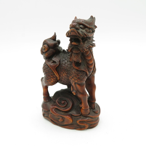 269 - Fruitwood oriental Fu dog with incredible carved detail - slight damage to one horn - see photos 100... 