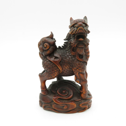 269 - Fruitwood oriental Fu dog with incredible carved detail - slight damage to one horn - see photos 100... 