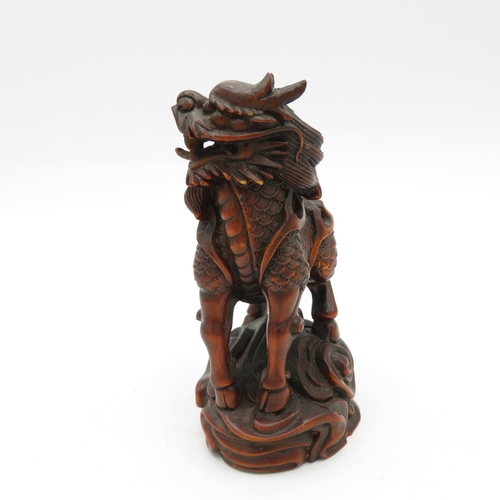 269 - Fruitwood oriental Fu dog with incredible carved detail - slight damage to one horn - see photos 100... 