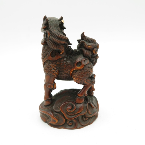 269 - Fruitwood oriental Fu dog with incredible carved detail - slight damage to one horn - see photos 100... 