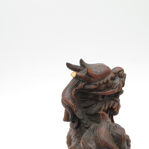 269 - Fruitwood oriental Fu dog with incredible carved detail - slight damage to one horn - see photos 100... 