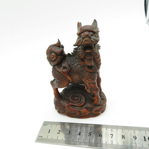 269 - Fruitwood oriental Fu dog with incredible carved detail - slight damage to one horn - see photos 100... 