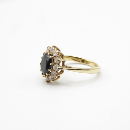 37 - 9ct gold ring with dark stone and CZ size O  4.2g